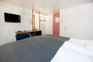Postel nebo postele na pokoji v ubytování DFDS MiniCruise Oslo - Copenhagen - Oslo