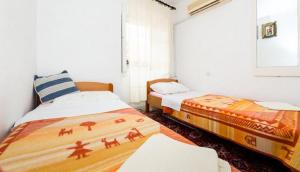 Posteľ alebo postele v izbe v ubytovaní Rooms Kisic