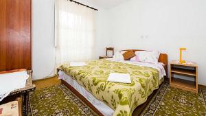 Posteľ alebo postele v izbe v ubytovaní Rooms Kisic