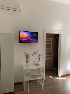 TV a/nebo společenská místnost v ubytování B&B Piano Romano -con parcheggio privato gratuito-