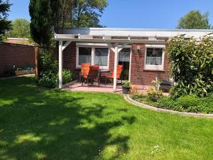 Zahrada ubytování Haus Annegrete mit überdachter Terrasse zum Garten