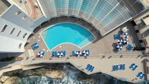 an aerial view of a pool on a cruise ship at Paradise Bay Resort in Mellieħa