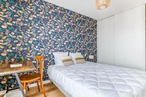 Cama ou camas em um quarto em Sejournez dans ce charmant appartement au coeur de Noirmoutier en l Ile