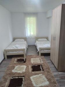 Postel nebo postele na pokoji v ubytování Guest house Erdan