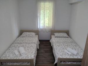Postel nebo postele na pokoji v ubytování Guest house Erdan