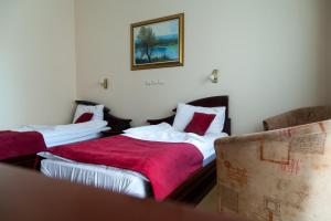 Voodi või voodid majutusasutuse Hotel Villa Majur toas