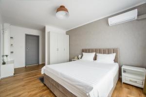 Posteľ alebo postele v izbe v ubytovaní Apart Hotel Fresh