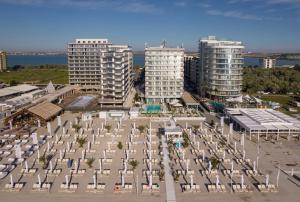 an aerial view of a city with tall buildings at Hotel Opera Mamaia in Mamaia