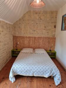 Postel nebo postele na pokoji v ubytování Domaine De La Cour Vautier