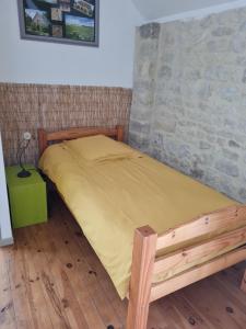 Postel nebo postele na pokoji v ubytování Domaine De La Cour Vautier