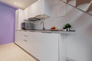 Kuchnia lub aneks kuchenny w obiekcie Realkasa Luxury S.Orsola Apartments