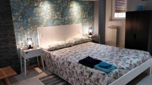 Voodi või voodid majutusasutuse Suite time Van Gogh toas