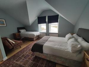 Postel nebo postele na pokoji v ubytování 4 bayview bundoran