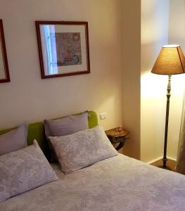 A bed or beds in a room at Mulino dell'Abbazia Country Resort