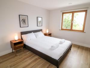 Postel nebo postele na pokoji v ubytování Traeannagh Bay House