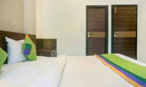 Treebo Five Elements, Lonavala客房内的一张或多张床位