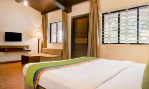 Treebo Five Elements, Lonavala客房内的一张或多张床位
