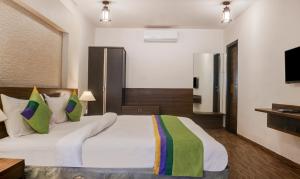 Treebo Five Elements, Lonavala客房内的一张或多张床位