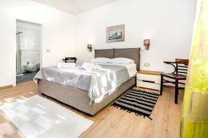 Posteľ alebo postele v izbe v ubytovaní Apartments El Corsaro