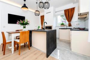 Kuchyňa alebo kuchynka v ubytovaní Apartments El Corsaro