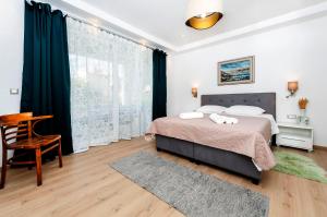 Posteľ alebo postele v izbe v ubytovaní Apartments El Corsaro