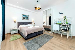 Posteľ alebo postele v izbe v ubytovaní Apartments El Corsaro