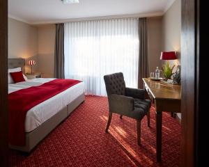 Postel nebo postele na pokoji v ubytování Landhotel & Gasthof Cramer