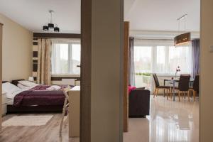 Posteľ alebo postele v izbe v ubytovaní Gdańsk Comfort Apartaments Łąkowa