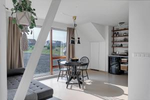 Posezení v ubytování Eyvindarholt Guesthouse