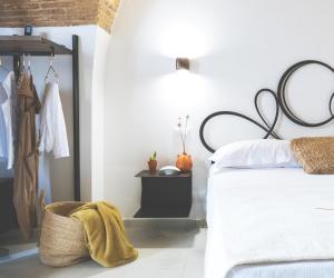 
A bed or beds in a room at Le Dimore del Borgo - Room & Breakfast
