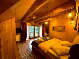 Postel nebo postele na pokoji v ubytování Chalet du Lac