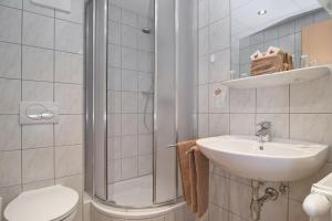 Ein Badezimmer in der Unterkunft Hotel-Pension Melcher