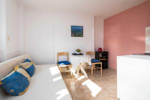 a living room with a couch and a table at Apartments Biba in Dubrovnik
