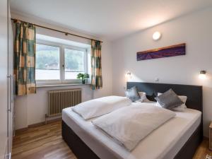Posteľ alebo postele v izbe v ubytovaní Appartementhaus Montana KG