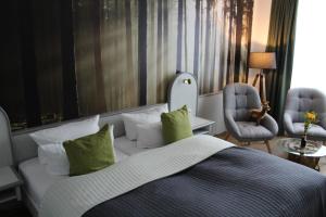 Voodi või voodid majutusasutuse Hotel Rennsteig toas +37 fotot