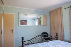 Łóżko lub łóżka w pokoju w obiekcie OLIVES Estate APARTMENTS