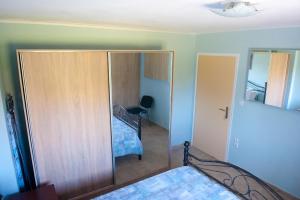 Łóżko lub łóżka w pokoju w obiekcie OLIVES Estate APARTMENTS