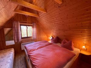 Postel nebo postele na pokoji v ubytování Berghütte Fichtelstreich