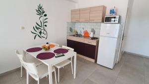 Kuchyň nebo kuchyňský kout v ubytování Batkoski Apartments