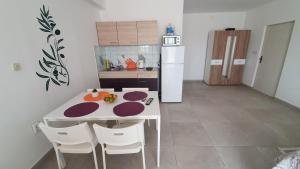 Kuchyň nebo kuchyňský kout v ubytování Batkoski Apartments