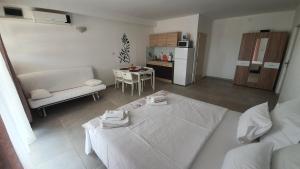 Postel nebo postele na pokoji v ubytování Batkoski Apartments