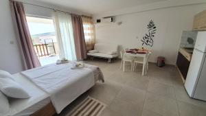 Postel nebo postele na pokoji v ubytování Batkoski Apartments