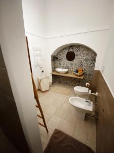 Vannituba majutusasutuses Co Mó - Camera a Sud - Affittacamere