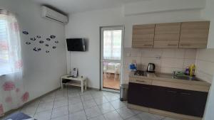 Kuchyň nebo kuchyňský kout v ubytování Batkoski Apartments