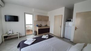 Postel nebo postele na pokoji v ubytování Batkoski Apartments