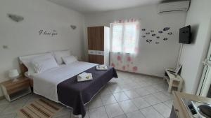Postel nebo postele na pokoji v ubytování Batkoski Apartments