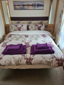 Uma cama ou camas num quarto em Bear Lodge