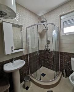 a bathroom with a shower and a sink at Holiday Home Kalicanin in Bar +60 photos