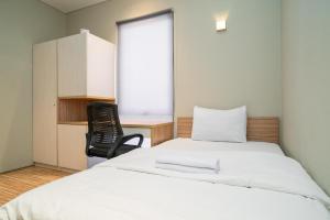 Katil atau katil-katil dalam bilik di Three J Residence
