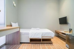 Katil atau katil-katil dalam bilik di Three J Residence